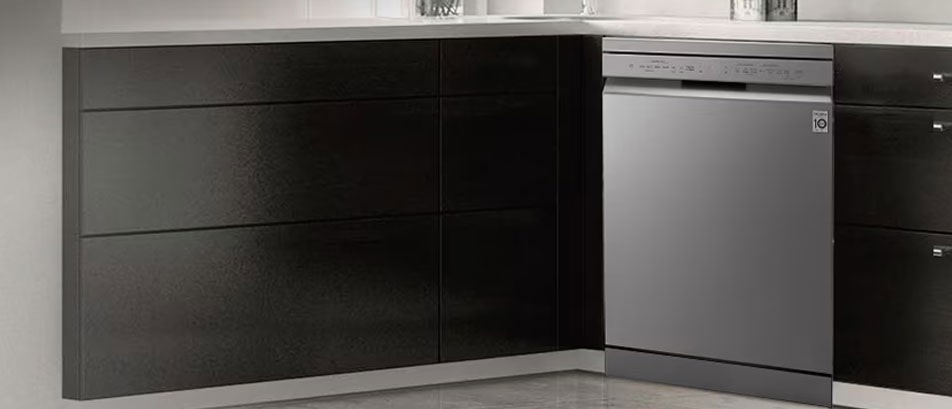 Overall view of a modern kitchen featuring an LG freestanding dishwasher seamlessly installed under the counter.