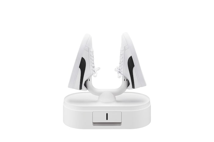 鞋子放在支撐物上的乾燥箱圖片