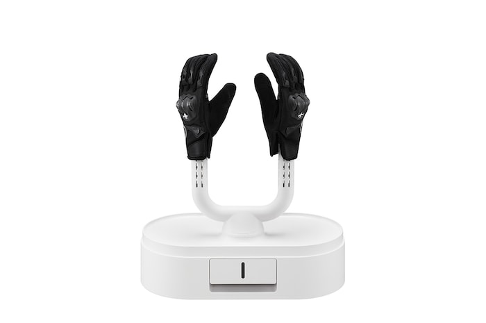 黑色手套放置在打開的烘物箱