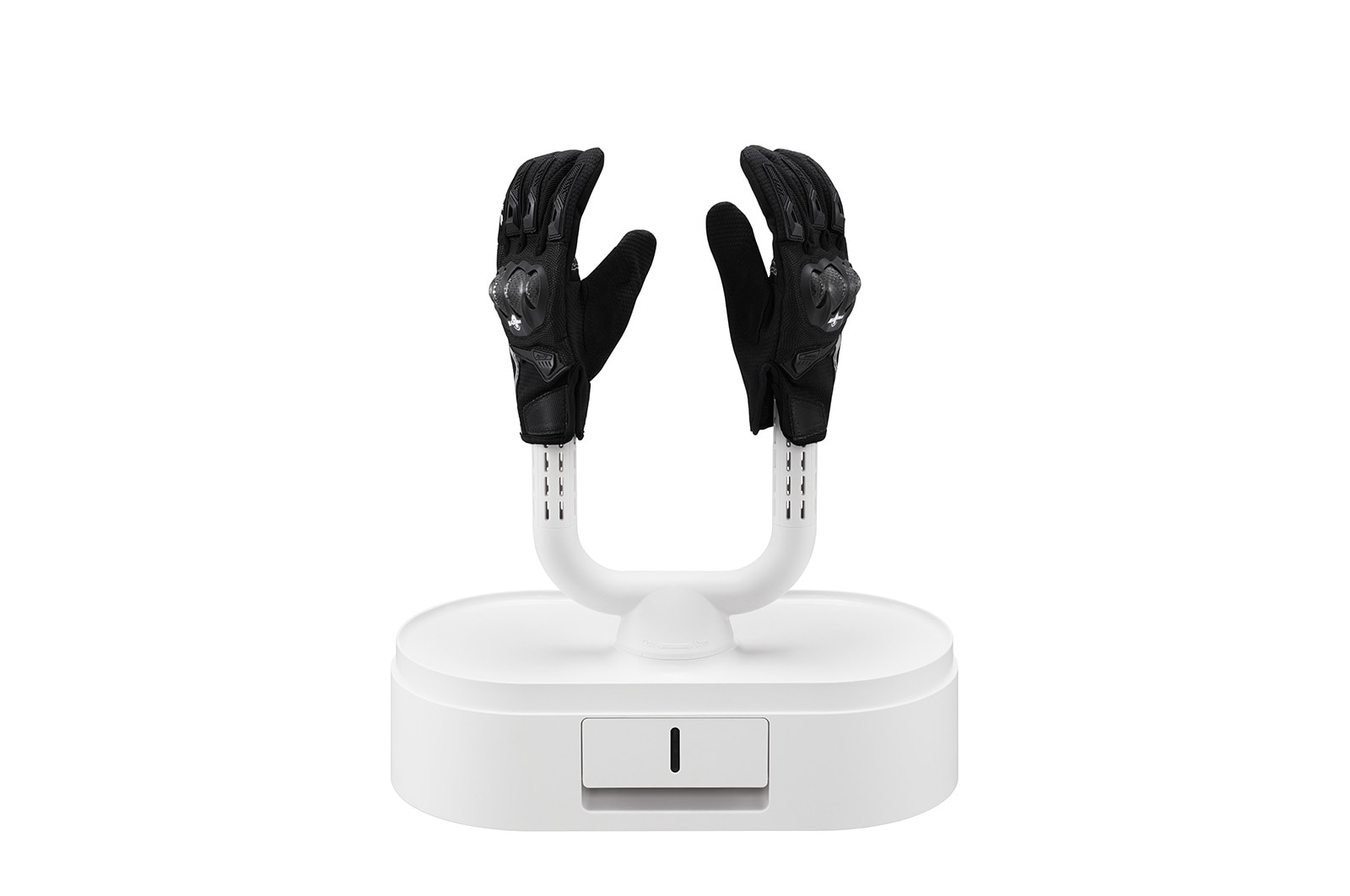 黑色手套放置在打開的烘物箱