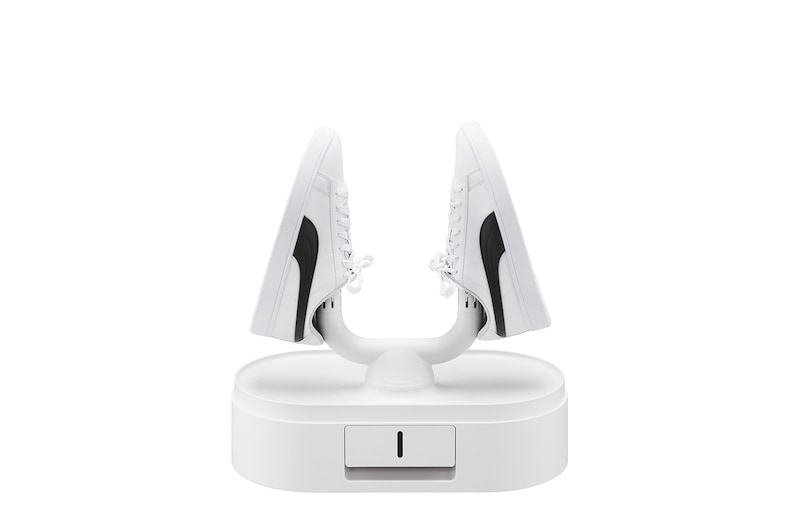 白底鞋放置在打開的烘物箱