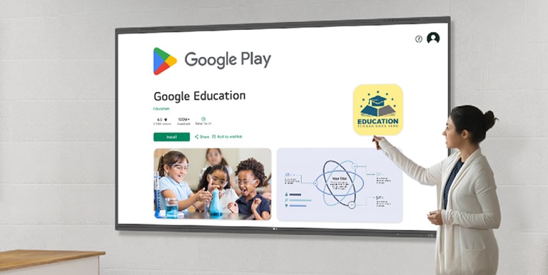  一位女士正在瀏覽 Google Play 商店，下載教育應用程式。LG 的智慧板是 Google 認證的互動式白板。