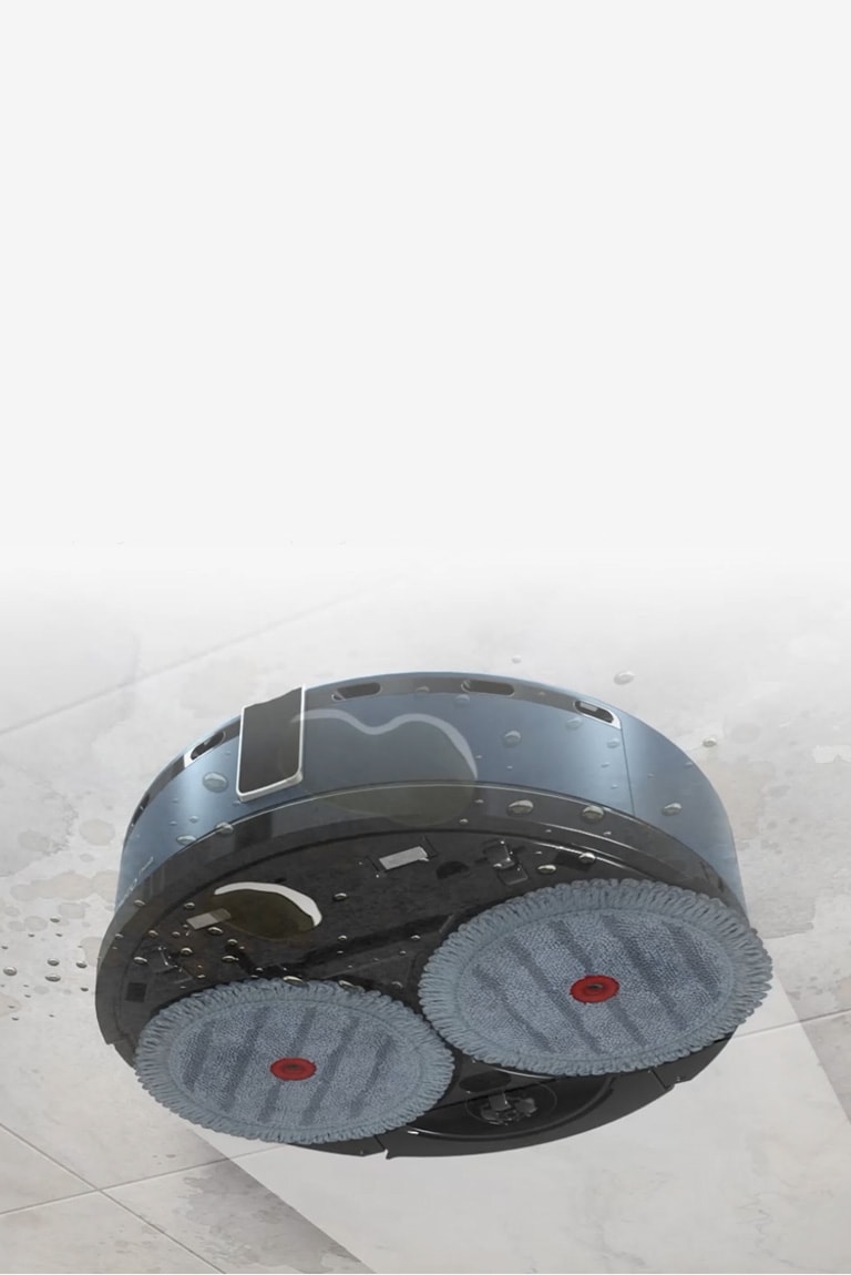 A video of the LG CordZero ThinQ™ M9 mopping a dirty surface at an angle to show the two mops on the bottom moving in a circular motion.