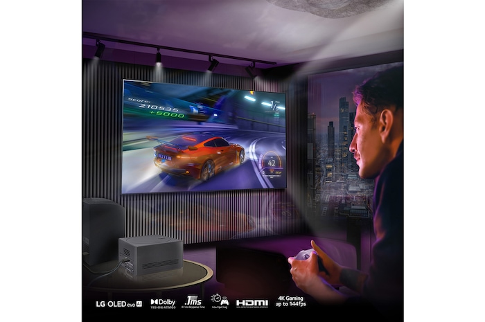 An LG SIGNATURE OLED M4 mounted on a living room wall and a laptop on a table in front displaying the same car racing game. A close-up of a Zero Connect Box on a smaller table, with a console connected underneath and a red Wi-Fi signal and red beam emitting towards the TV. The words "hassle FREE" in the bottom left corner.
