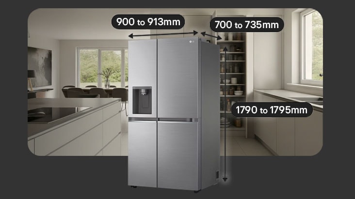 Large-capacity LG American-style fridge freezer in a spacious kitchen. Behind it, a pantry with dishes is on the right, an induction hob on the left, and a dining table in the back.