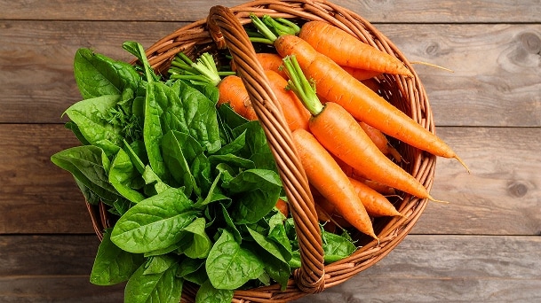 LG refrigerator high humidity drawer recommendation showing fresh carrots and spinach ideal for moisture retention