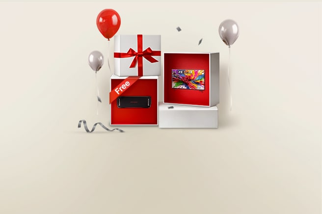 A festive gift box with red and white wrapping, balloons, and confetti. Inside the box is a colorful coupon or card.