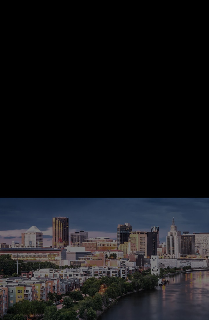 Dull low-resolution cityscape. The alpha 11 AI processor appears. Different circle icons move around the cityscape showing how the processor is analyzing every element in the frame. The processor pulses with power and the cityscape image is suddenly brighter, more detailed, and with 4K resolution thanks to AI Super Upscaling.