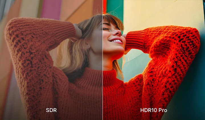 A photo of a girl in a red sweater split down the middle to show the left side in SDR and the right side in HDR10 Pro. The right side of the image is more sharp and in contrast in comparison to the left side of the image.