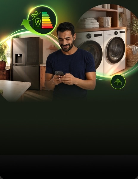 Man using a smartphone in a modern laundry room with LG washer, dryer and refrigerator, surrounded by glowing energy-efficiency graphics.