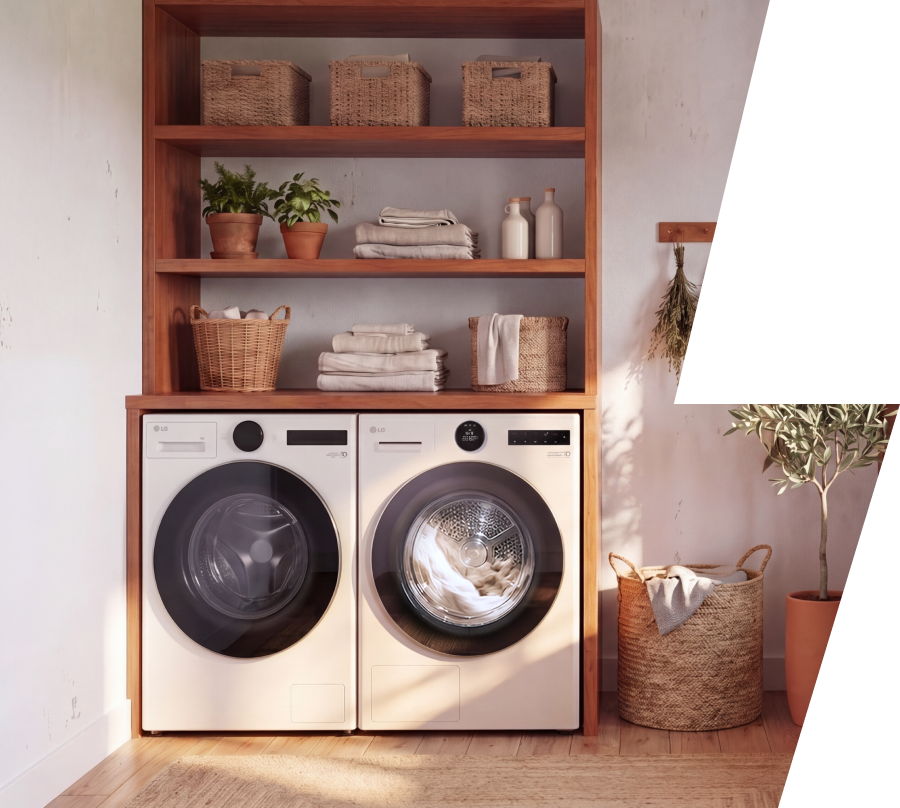 A white front-load washer and matching dryer are built into a wooden laundry cabinet, surrounded by neatly folded towels, woven baskets, and decorative plants.