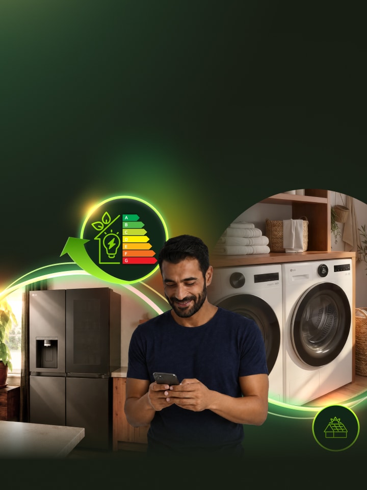 Man using a smartphone in a modern laundry room with LG washer, dryer and refrigerator, surrounded by glowing energy-efficiency graphics.