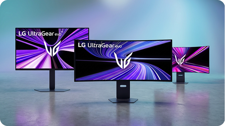 3 ultragrear lg monitors on a shiny concrete floor