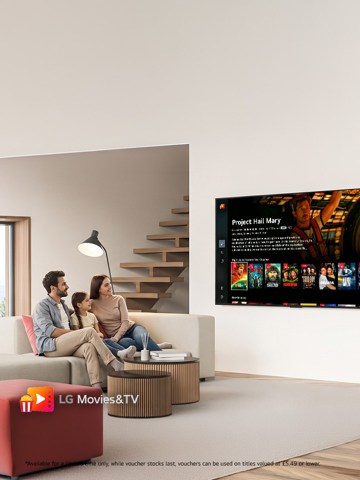 a young family sitting in a sleek, modern lounge in front of an lg tv with a movie screenfill
