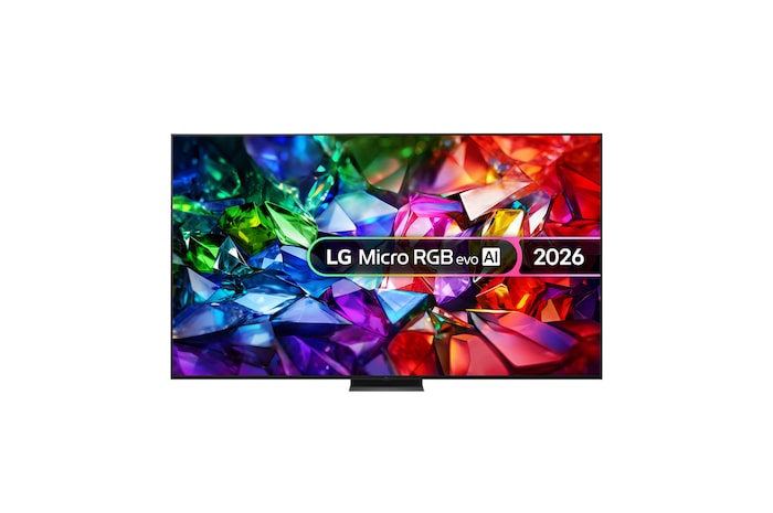 The front view of LG Mini RGB evo AI MRGB85, released in 2026, features a slim black bezel with short feet, while a vivid, crystalline image of sharply defined multicolored facets fills the screen.