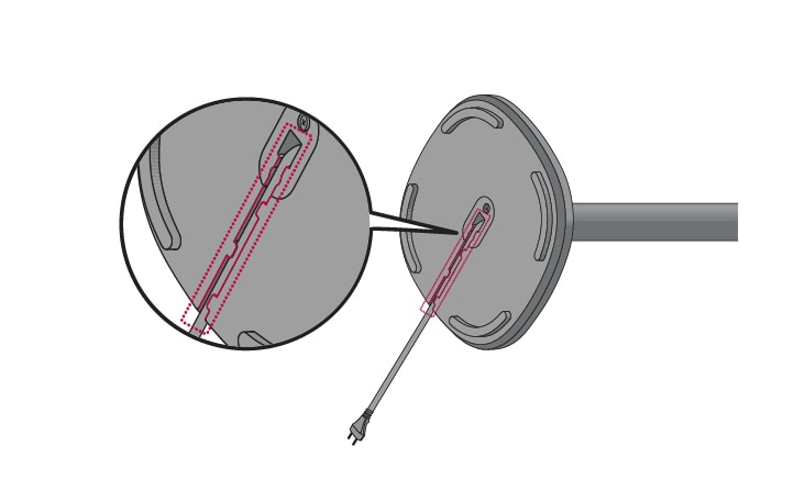 Route the power cable along the groove on the bottom of the stand base