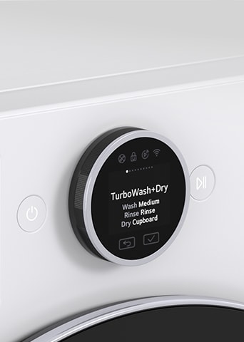 LG white front load washer dryer (F4X9EUP25M) shows a close-up of the control panel displaying the TurboWash+Dry course on the screen.