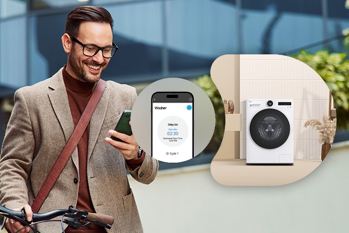 A man smiles while looking at his smartphone showing the LG ThinQ app, with an LG white front load washer dryer (F4X9EUP25M) displayed on the right in a beige interior setting.