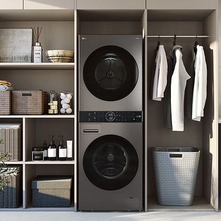The LG WashTower WT1210BBTN1 in black, featuring its space-saving single-unit design installed in a modern laundry closet.