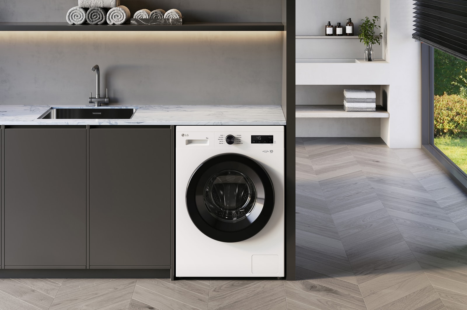 The LG 9kg washing machine F4X1008NWK in Essence White, shown built-under a counter in a modern laundry room.