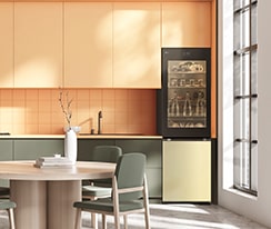 An image of a refrigerator placed in a living room with a cute interior.