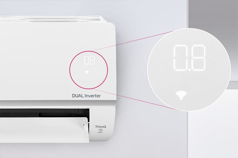 Half of the LG air conditioner can be seen installed on the wall with the front door open indicating it's on. A circle is around the air quality lights of the machine and a magnified circle is extened out to show the green lights of the air quality panel and the numbers to show the precise air quality. The DUAL Inverter logo can be seen on the machine.