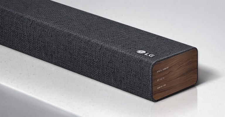Close-up of LG Soundbar right side with LG logo shown on bottom right corner on a product.