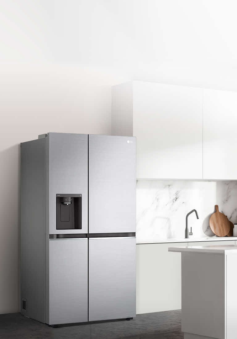 A side view of a kitchen with a black InstaView refrigerator installed.