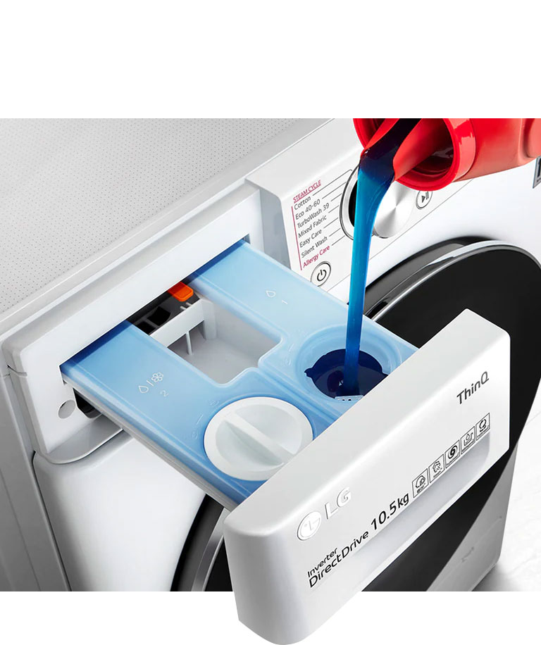 Detergent is pouring into the washing machine's detergent container.
