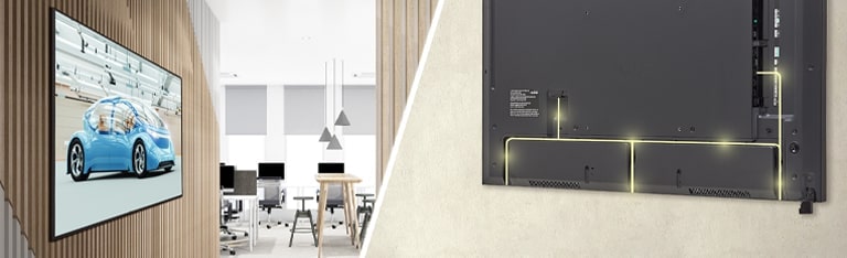 There are five people conducting a meeting in a room with UL3J series installed on the wall. There is another UL3J series installed across the meeting room on the wall past the window on the left.