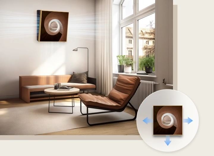 By dispersing cool air through the left, right, and bottom of the frame, providing a refreshing breeze in every inch of your room.	