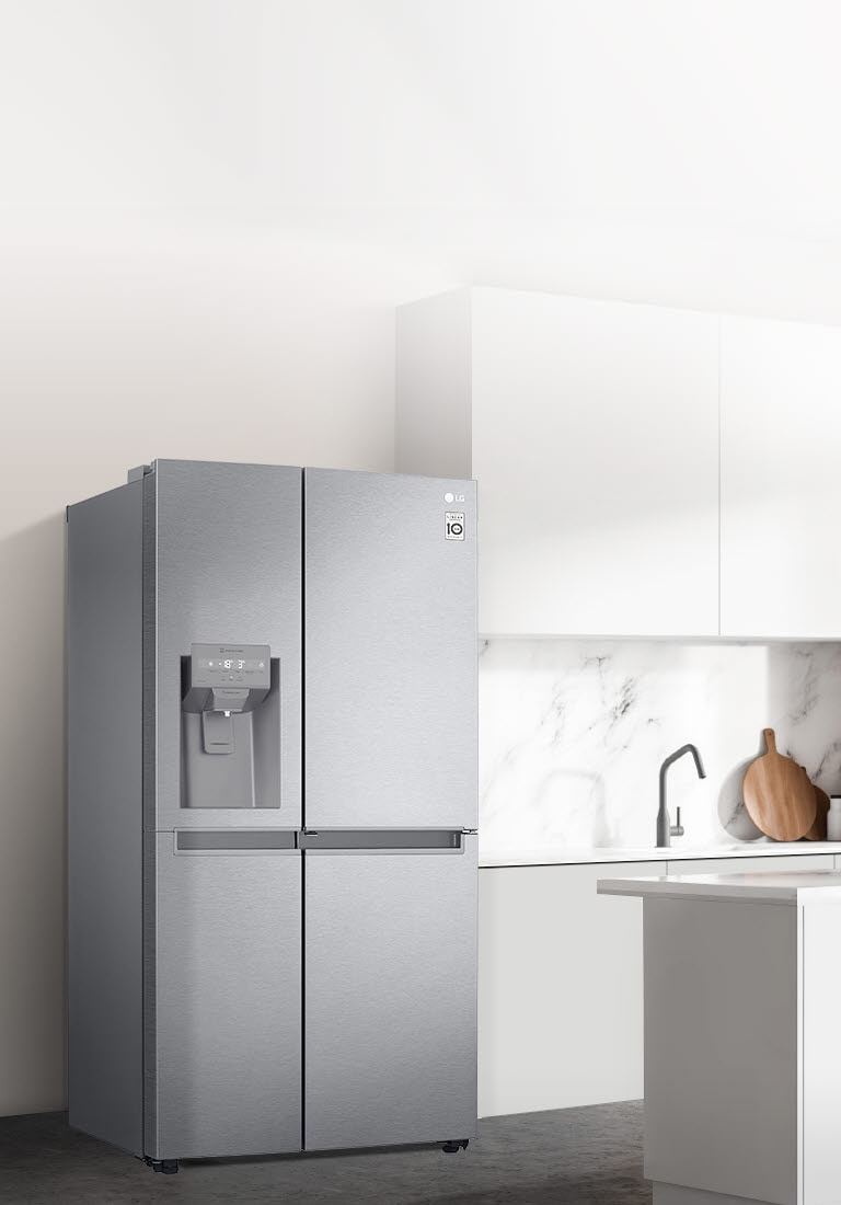 A side view of a kitchen with a black InstaView refrigerator installed.