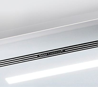 A diagonal view of the shelf with metallic paneling on the interior of the refrigerator.