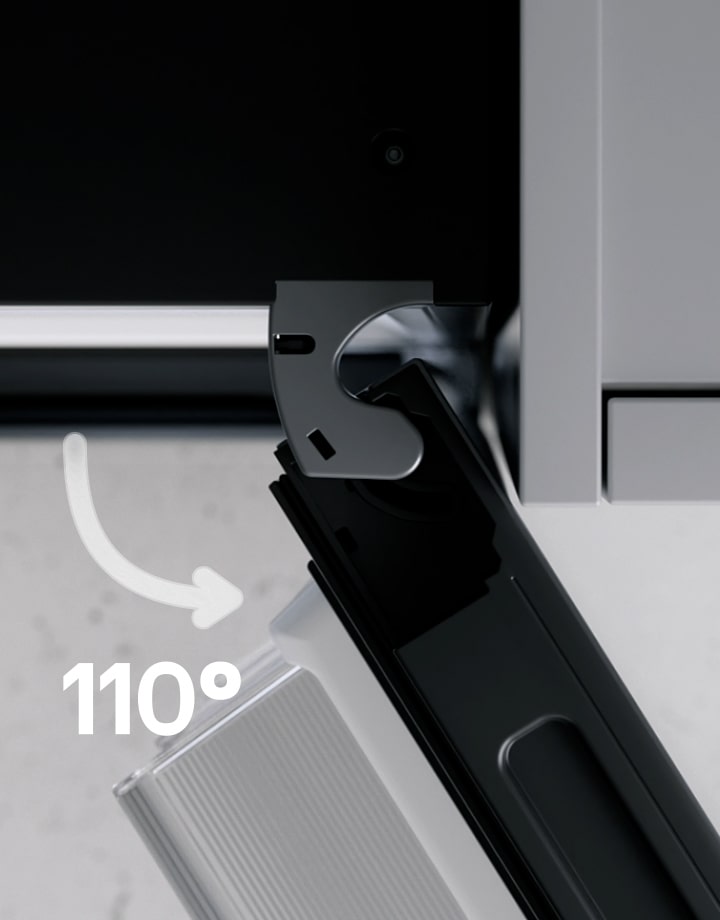 LG fridge freezer(GBBS726CEV) with its right door opened to 110 degrees, showing a curved hinge at the top closely aligned with an adjacent grey cabinet wall.	
