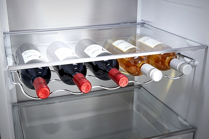 Close-up of wine rack with 5 bottles, enabling efficient use of space.