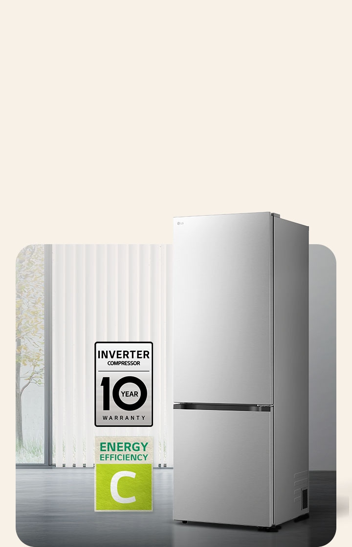 LG bottom freezer (GBBW726CPY) matte black front view in bright room with vertical blinds with 10 year compressor warranty and Energy Efficiency C icons below