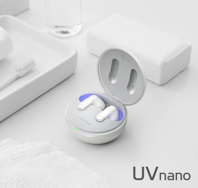 Image of TONE Free placed with objects representing cleanliness such as soap, toothbrush and toothpaste. The image contains a copy of Refresh Your BUDS and a UVnano logo.