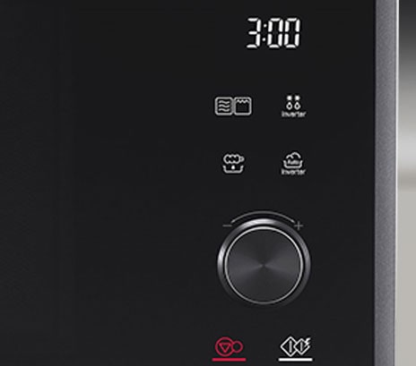 The image shows the front view of neochef microwave oven with a hand on the touch panel.