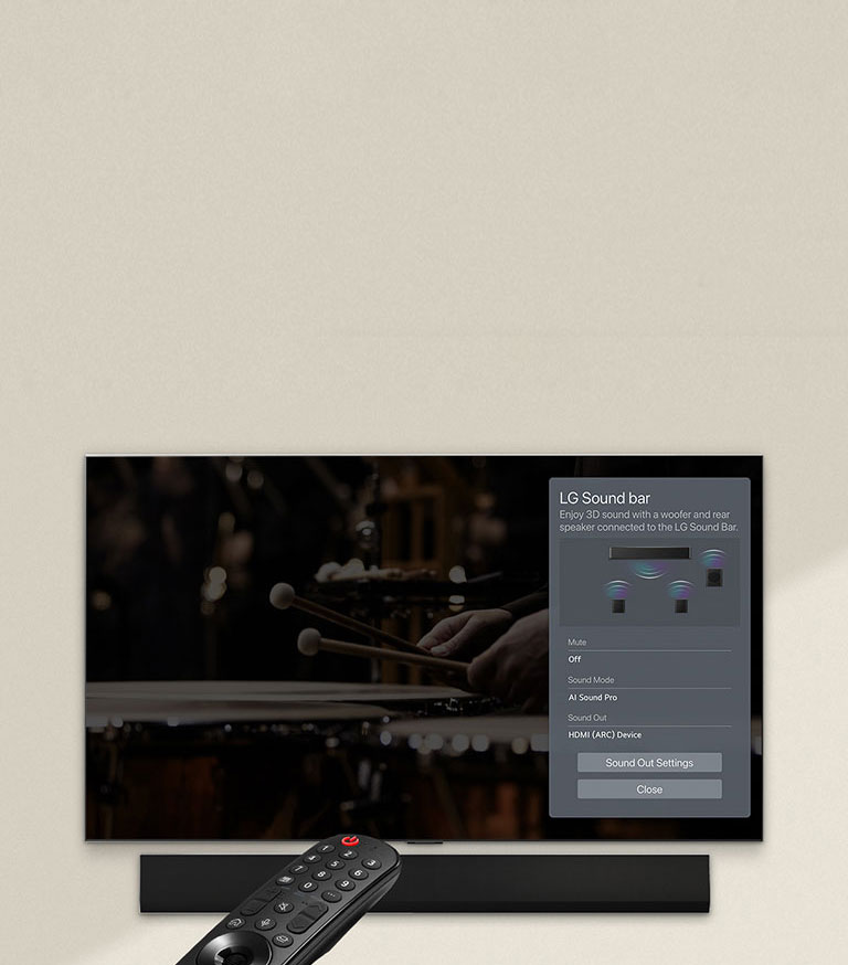 An image of a remote control pointed at an LG OLED TV showing soundbar control settings on the right side of the screen.