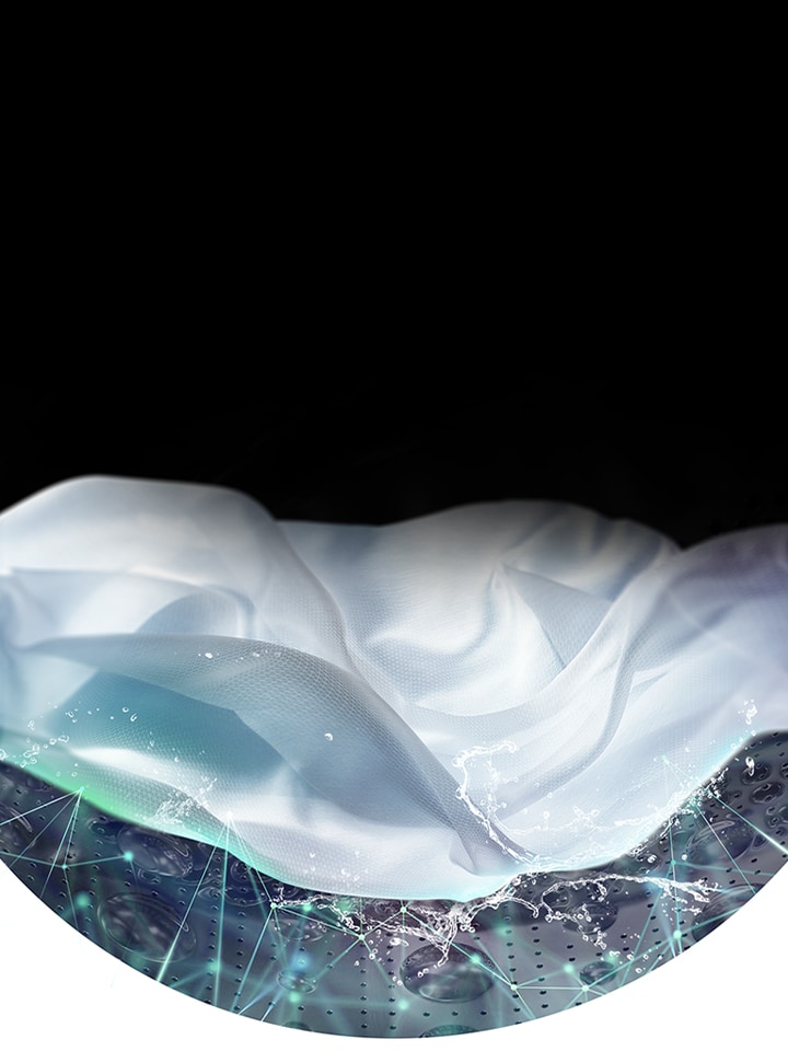 A white piece of cloth is shown in the drum of the washing machine front load washer being washed.	