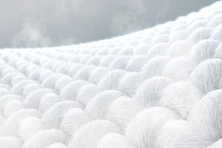 A video of an enlarged and steamed fabric detail 