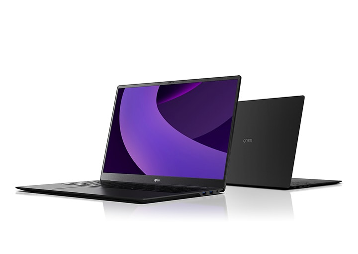 The image shows the laptop with its screen open and angled to the left, and the laptop with the logo visible behind it. There is a purple cylindrical image crossing the screen.	