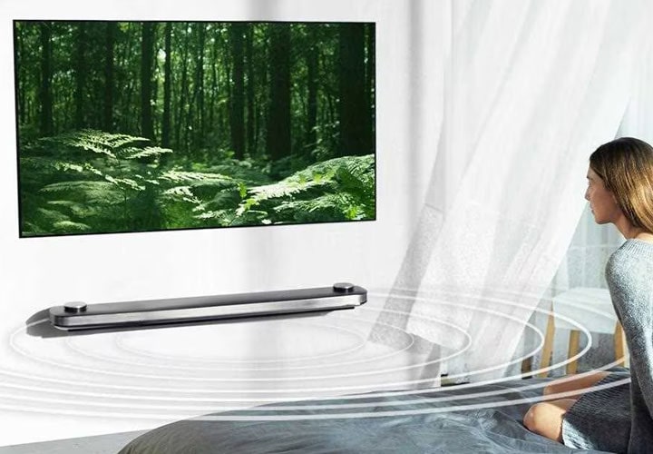 Audio from an LG soundbar fills the room.