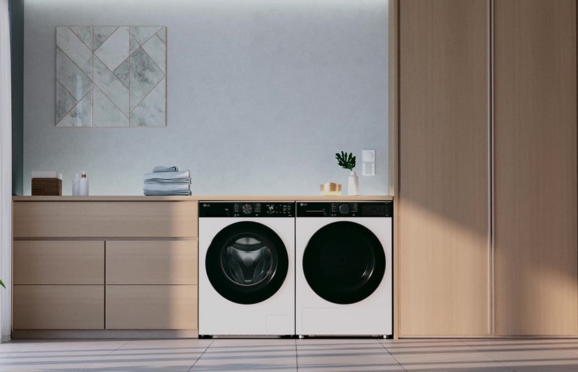 Image of LG washing machine and dryer installed in wooden interior household.