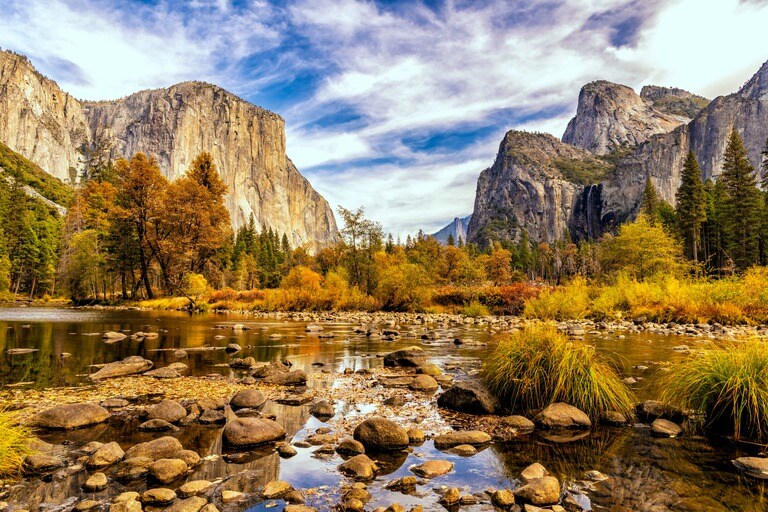Yosemite Valley in the fall, with golden hues illuminating the landscape—a perfect scene to enjoy with a camping gadget that lights up the night.