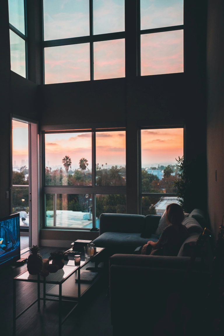 Enhance your home cinema experience with essential equipment including a smart TV, projector, and surround sound system.