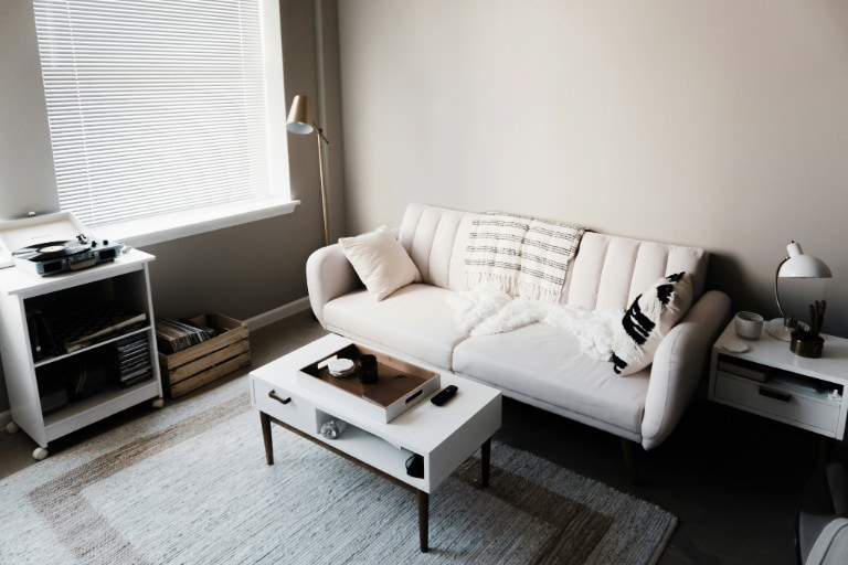Smart living room setup that elevates entertainment with high-tech devices seamlessly integrated for an enhanced viewing and listening experience.