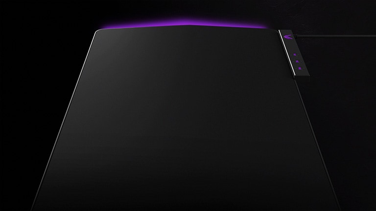 UltraGear ™ Gaming Pad with purple lighting on a black background.