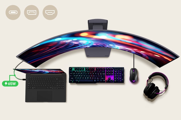 A 45-inch gaming monitor is positioned in the center of the desk, with various IT devices placed around it. 
