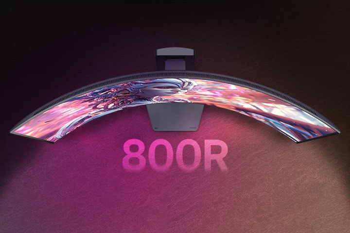 An animated video transitioning from a front view to a top view of a curved monitor.